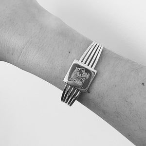 SOLD 🚫 Vintage Etched Tiger Bracelet